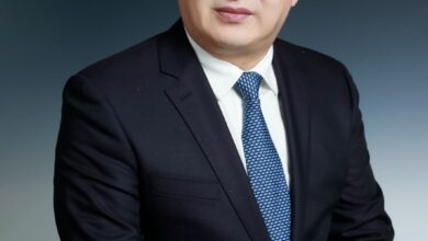 صورة العمل معًا لمواجهة تحديات الأمن العالمي وحماية السلام والاستقرار للعالم / تانغ جونغ دونغ